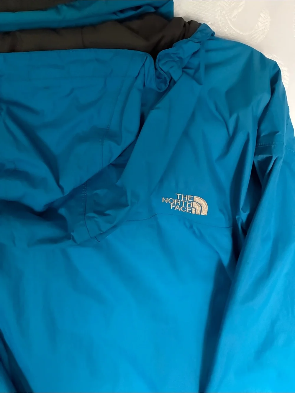 The North Face Men’s Bright Blue Windbreaker Jacket